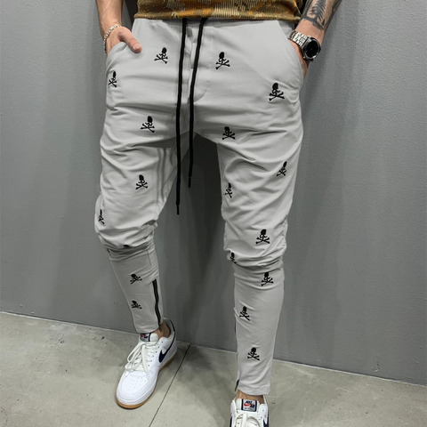 Pantalones con estampado de calavera y cordón a la moda para hombre 